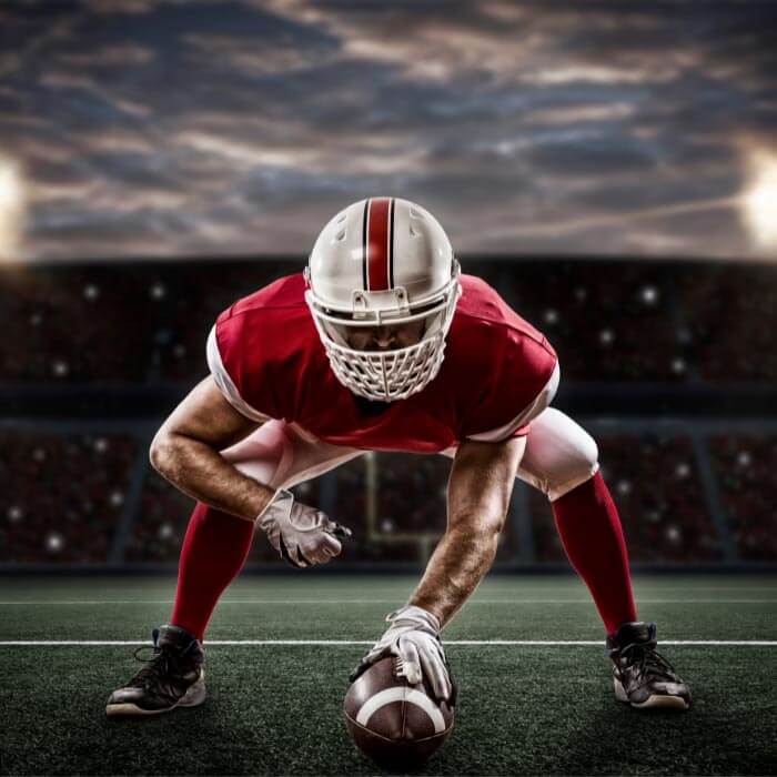 Football player ready to hike ball