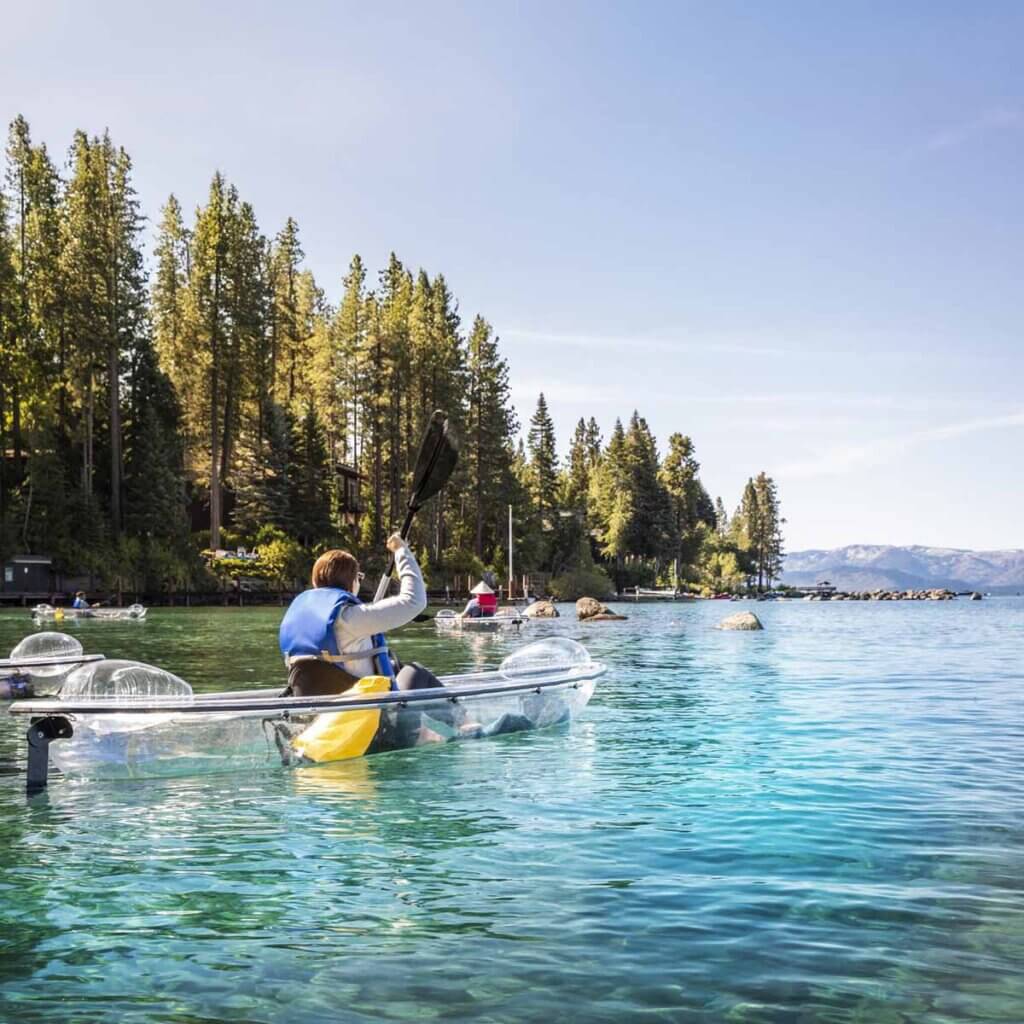 friends kayaking in lake tahoe