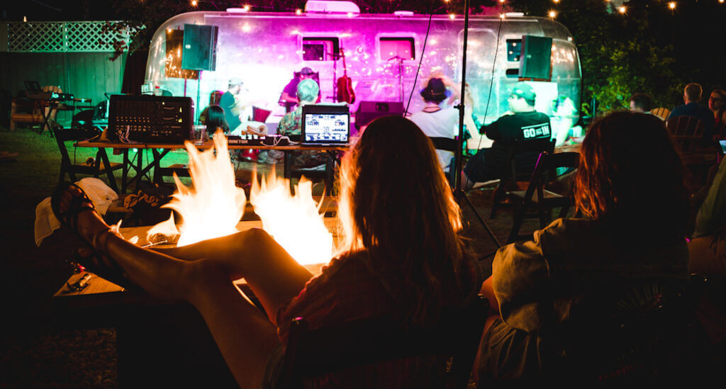 Bonfire and music at Base Camp Hotel